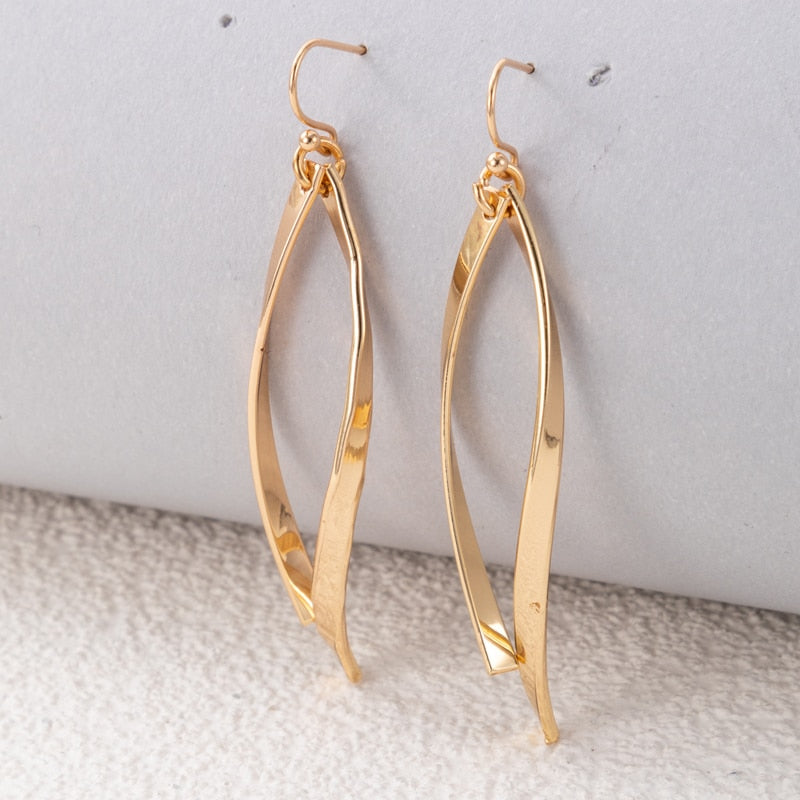 Gold Alloy Leg Charm Earrings