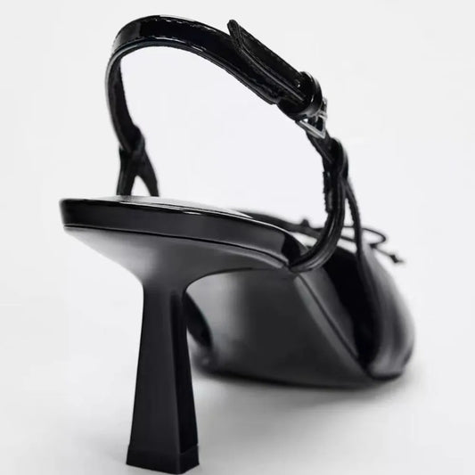 Black patent leather bow with pointed tip thin heels